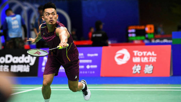 Badminton legend Lin Dan ruthless in worlds opener