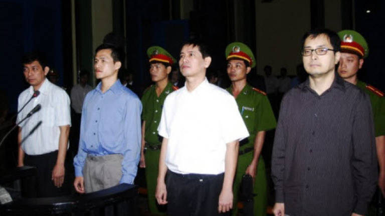 Vietnam frees two high-profile dissidents