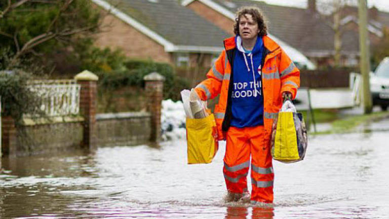 Britain deploys Royal Marines to help with floods