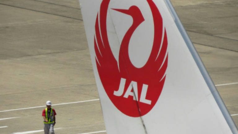 Japan Airlines flight makes emergency landing in Tokyo
