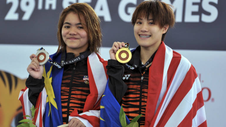 Divers lead with 3 gold to push Malaysia's tally to 81
