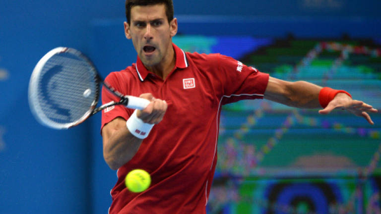Djokovic defeats Murray, as Kvitova wins in Beijing