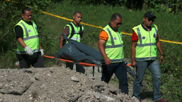 Woman's charred remains found near abandoned building Woman's charred remains found near abandoned building
