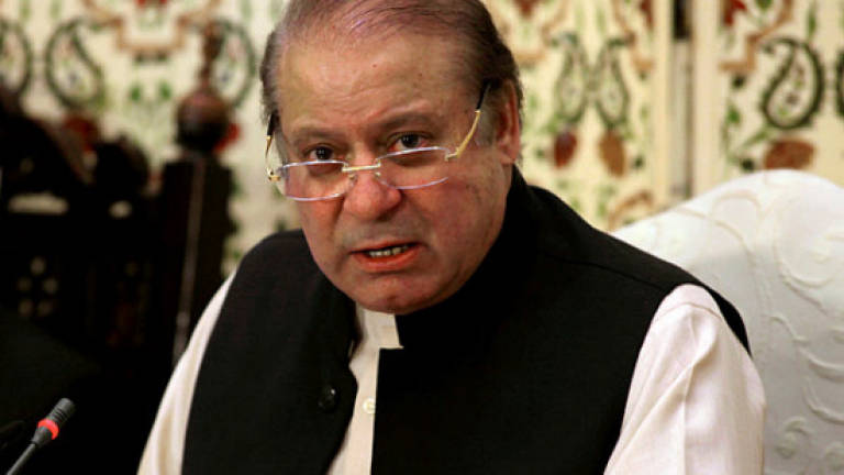 Former Pakistani PM vows to fight corruption charges