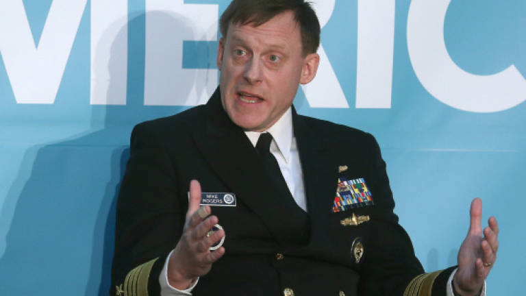 NSA chief seeks compromise on encrypted phone snooping