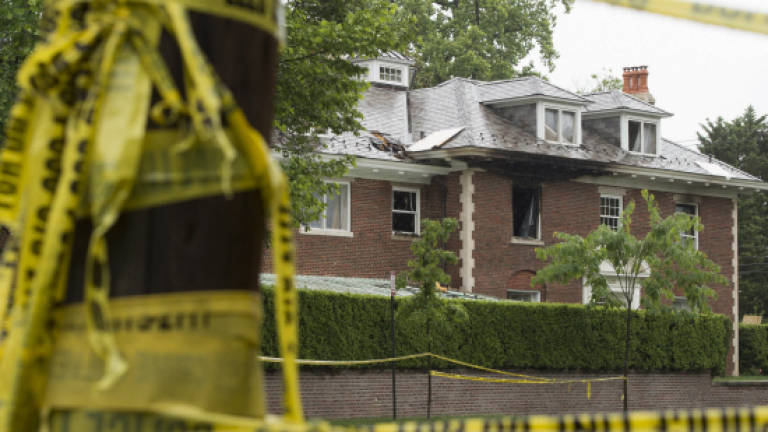 Washington mansion murder suspect 'did not act alone'