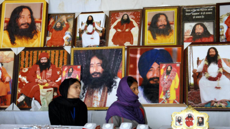 India court rules dead guru to remain in deep freeze for now