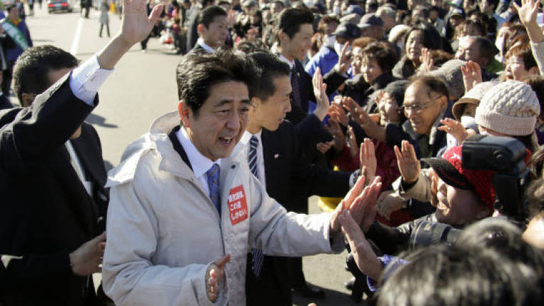 Japan kicks off election campaigning in 'Abenomics referendum'