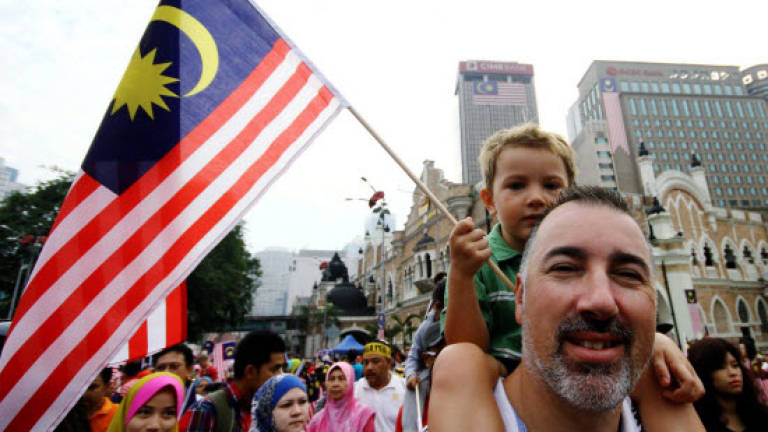 M'sians, tourists out in droves to celebrate Merdeka
