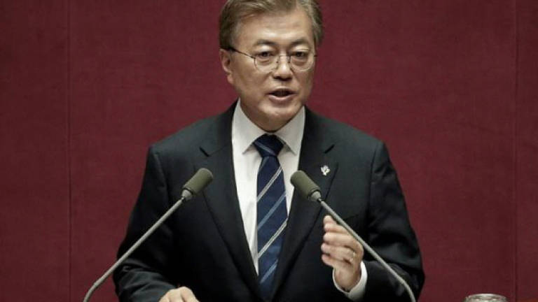 S. Korea's Moon heads to US as North threat grows