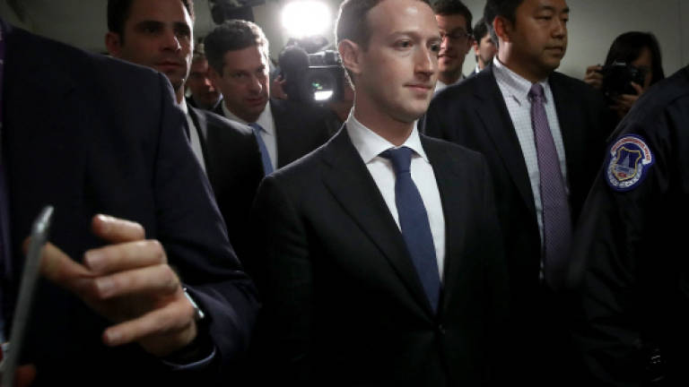 Facebook's Zuckerberg contrite ahead of grilling in Congress
