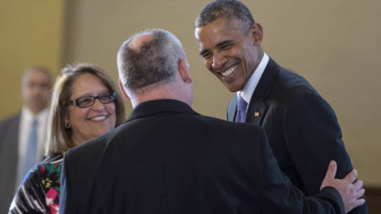 Obama in surprise visit to Cuban community church in Miami