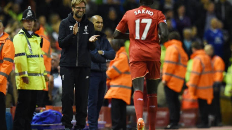 Liverpool seek Swansea success without Sakho