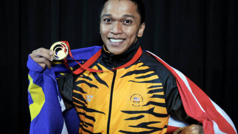 M'sian weightlifter Mohd Hafifi wins first gold medal