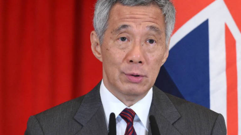 Singapore PM denies nepotism amid family feud in parliament speech