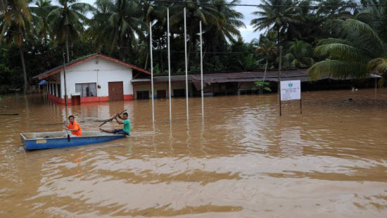 Over 100,000 evacuated in four flood-hit states