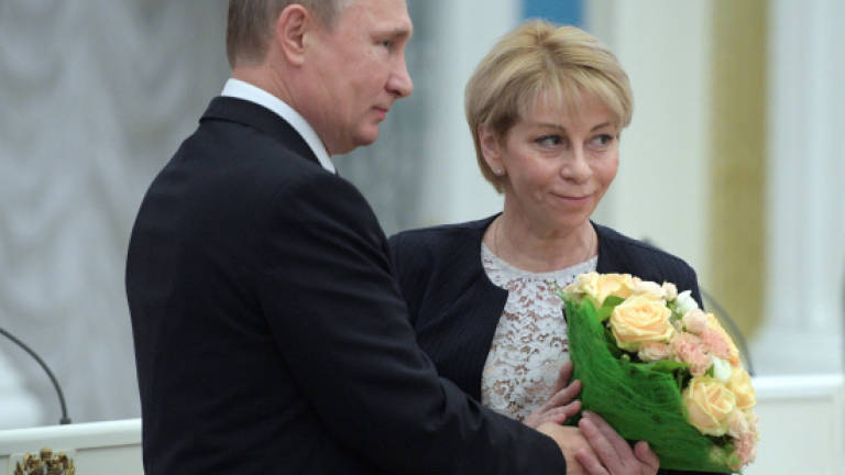 Russia mourns doctor killed in Syria-bound plane crash