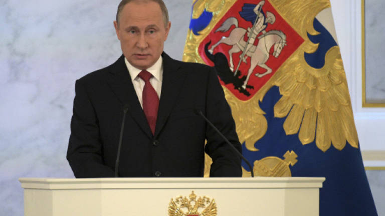Putin says Russia not 'looking for enemies'