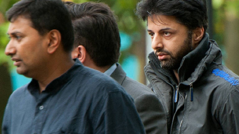 Dewani lands in S.Africa to answer honeymoon murder charge