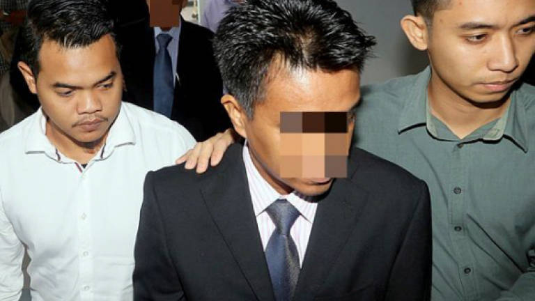 Former Misdec secretary, son charged with misappropriation of RM1.245m