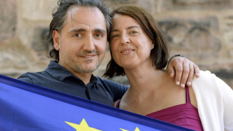 German-Greek couples embrace love in the time of crisis
