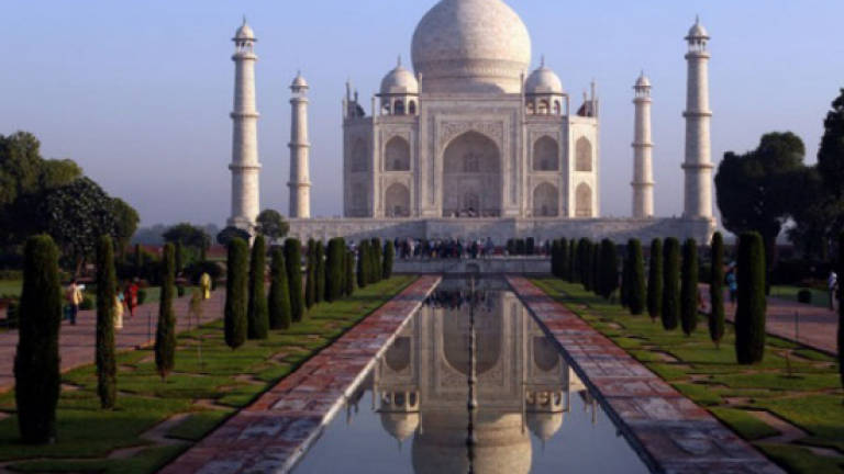India launches probe as insect excrement turns Taj green