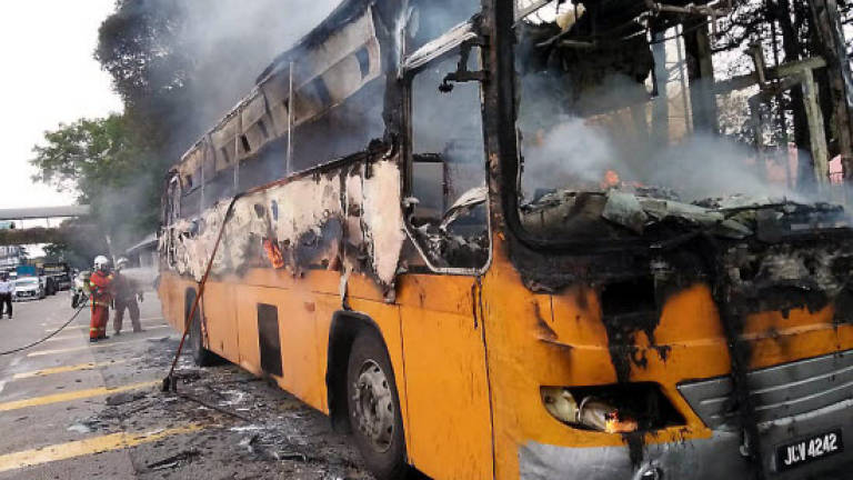Bus burnt, driver and 26 passengers safe