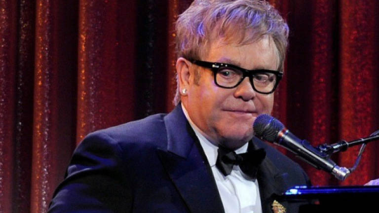 Pop singers re-imagine past hits of Elton John