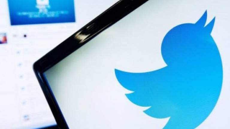 Twitter shares dive on word of growth challenges