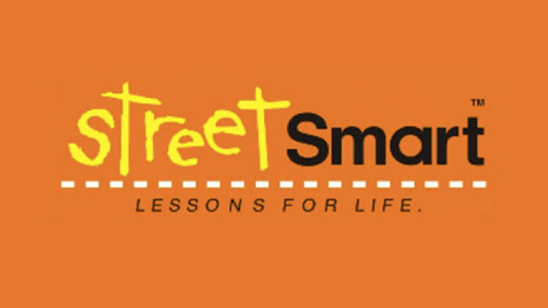 Petronas StreetSmart road safety awareness programme for Tmn Bayu Damai kids