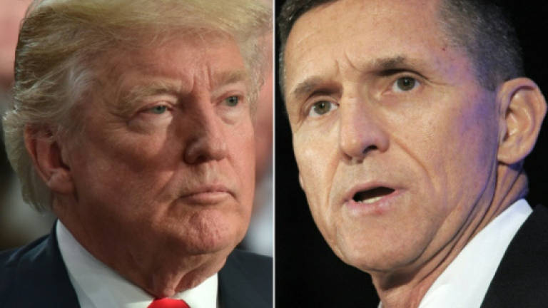 Trump shrugs off Flynn guilty plea