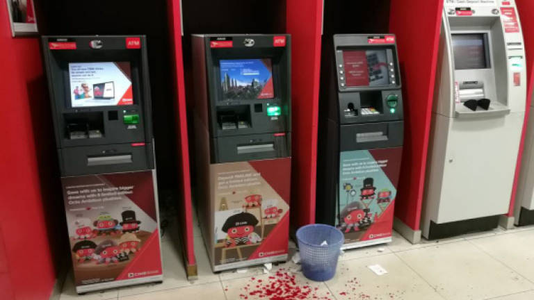 Cops nab man for punching ATM