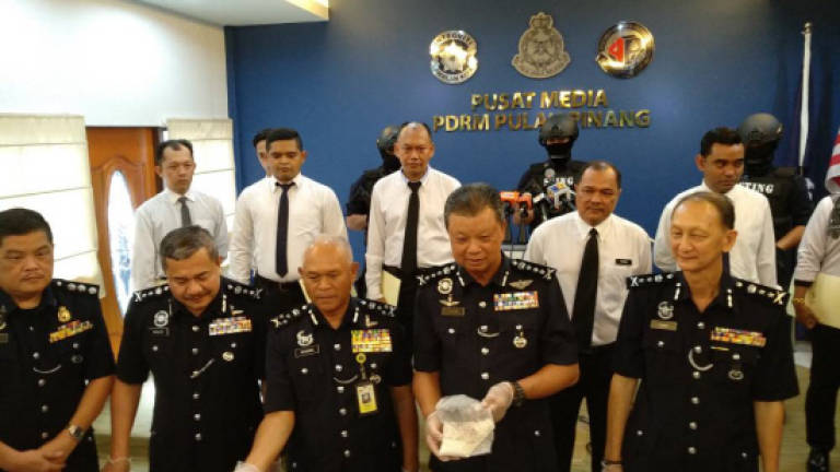 Pistols and handcuffs seized in anti-narcotics raid (Updated)