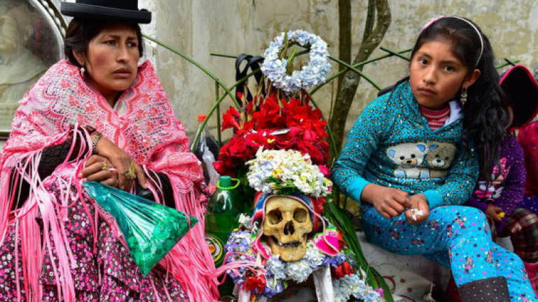Party time in the cemetery as Bolivians fete skulls