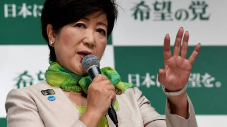 Japan's Koike: Media-savvy operator with stomach for a fight