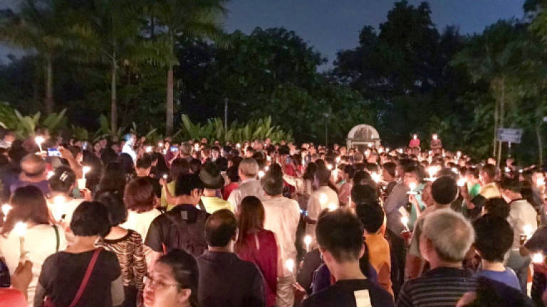 Missing pastor’s wife pours her heart out at candlelight vigil