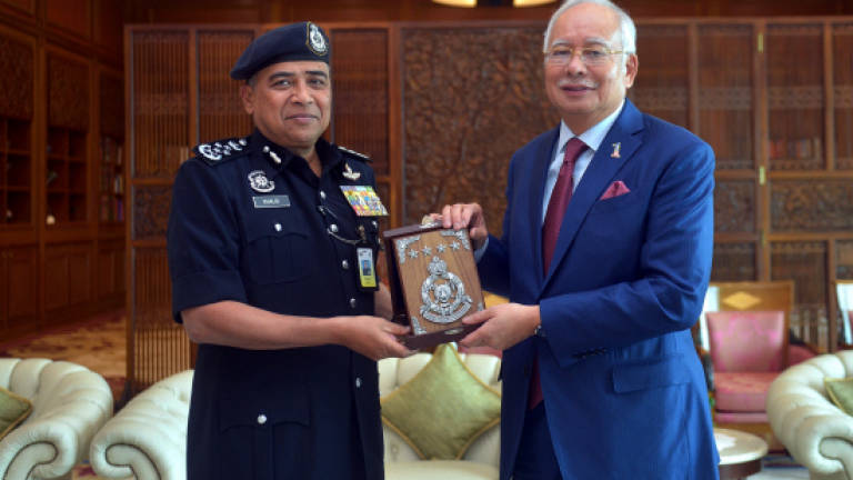 Retiring IGP Khalid calls on Najib