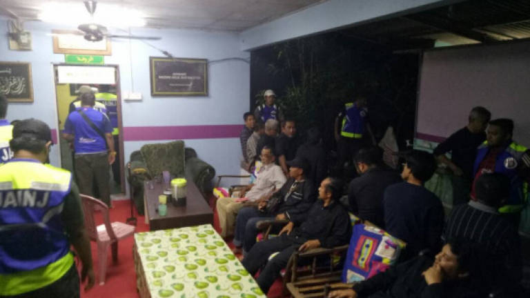 Late night raid on Shia learning centre sees arrests of 21 men