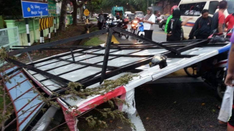 Death of motorcyclist in billboard collapse prompts probe