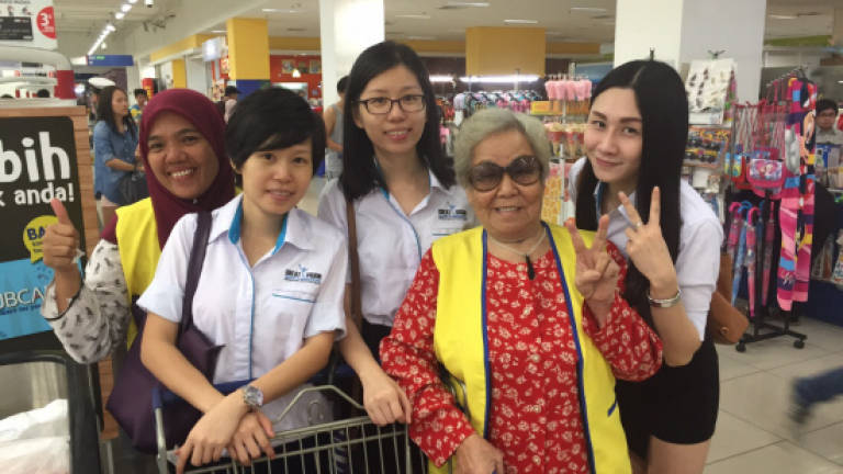 Shopping buddies help ease burden of underprivileged, visually impaired families