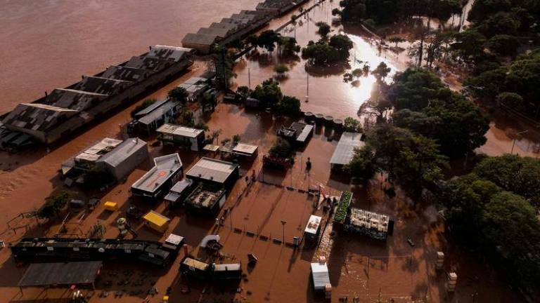Aerial view of the flooded port area of Porto Alegre, Rio Grande do Sul state, Brazil, taken on May 8, 2024. - AFPPIX
