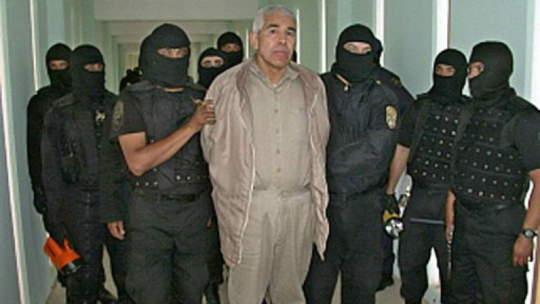 Mexican drug lord denies killing US agent