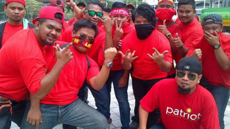'Red shirt' rally participants begin to assemble in KL