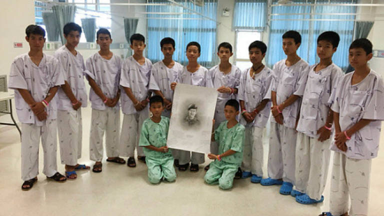 Thai boys rescued from cave to be ordained in Buddhist ceremony