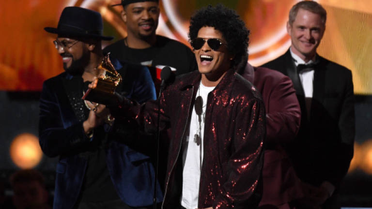 Bruno Mars surprises with Grammy sweep