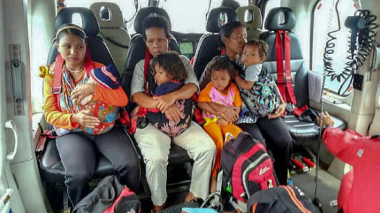 Helicopter mercy flight for ailing Orang Asli children