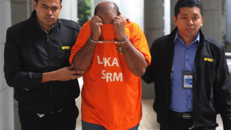Malacca graft case: Police officer remanded for 7 days