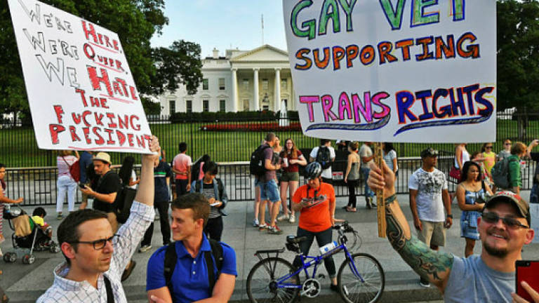 Pentagon to fund medical treatment for transgender troops into March