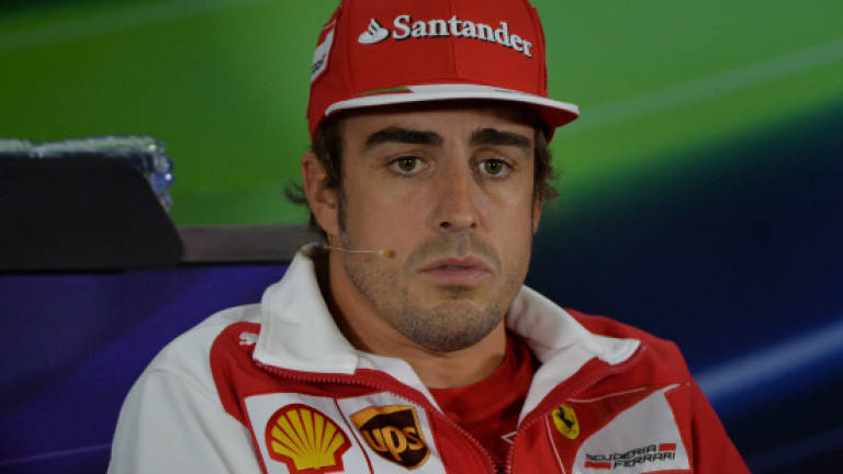 Alonso cheer, Raikkonen woe for Ferrari