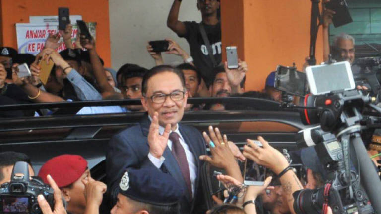 Anwar given royal pardon, released immediately